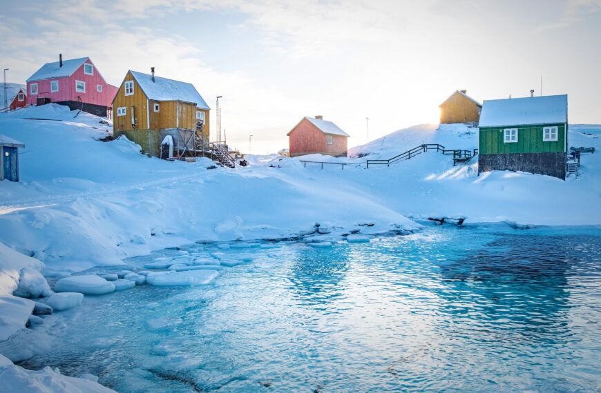 Colourful houses of Atammik near Maniitsoq, West Greenland during winter