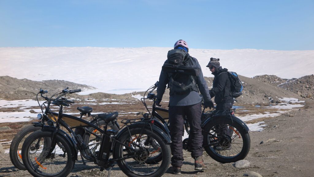 Two visitors on e-fatbikes near the Greenland Icecap - Kangerlussuaq